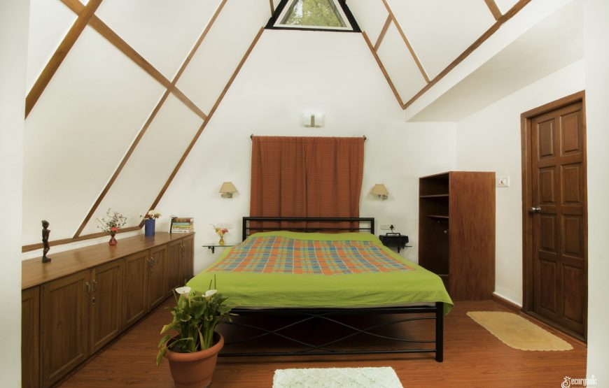 bedroom with well decorated interiors of tea estate stay in kotagiri